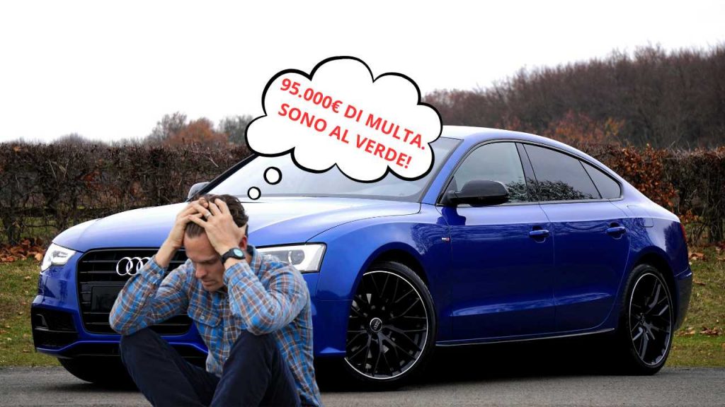 Uomo disperato seduto a terra vicino all'auto