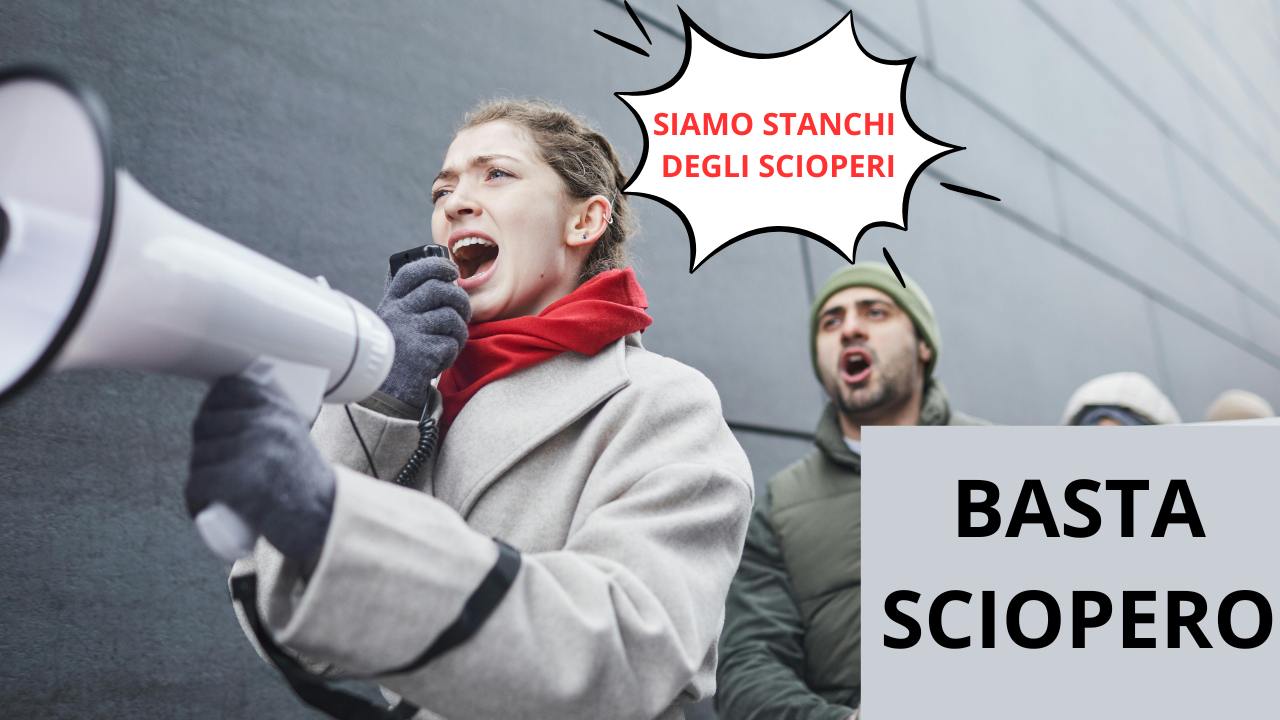 Uomo e donna si ribellano con cartello e megaofno